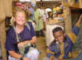 Eritrea Judi and boy at Asmara market.jpg (25526 bytes)