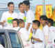 Thailand Phuket Veg Fest boys in white attire.jpg (22890 bytes)